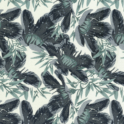 Dark navy and teal tropical palm leaf pattern on pale mint background; seamless botanical fabric print.