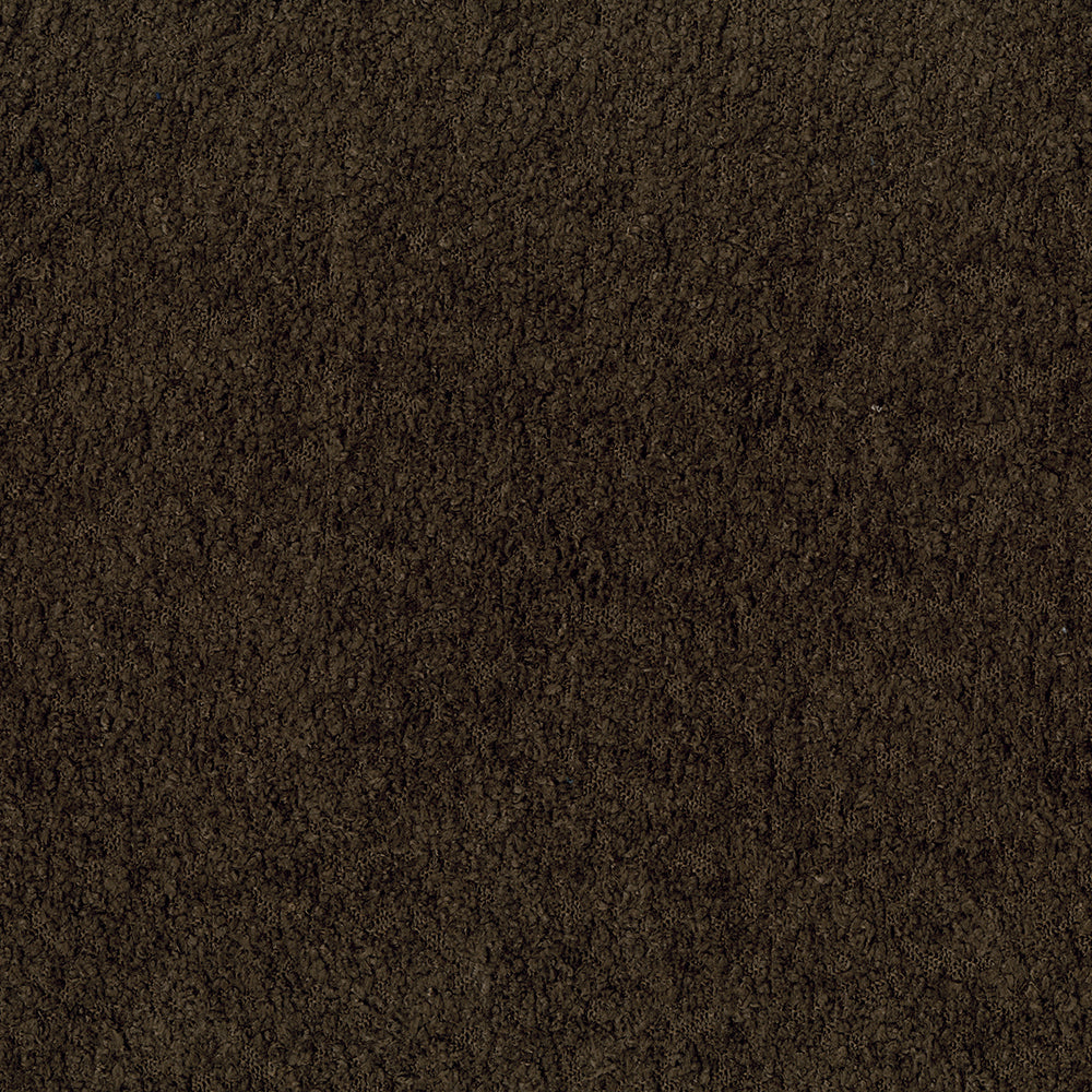 Macro shot of cocoa solid fabric fibers in dark brown with a rich textured weave.