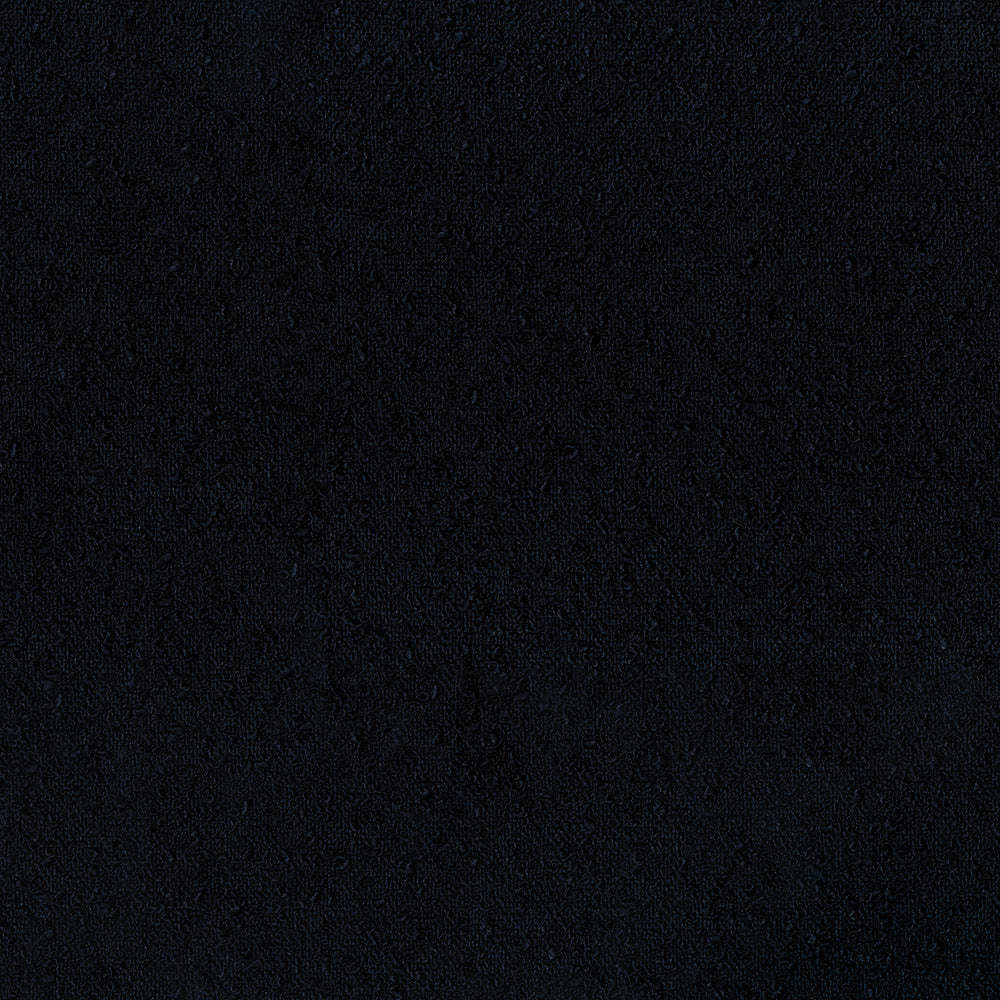 Deep black fuzzy fabric texture, soft plush feel; ideal for upholstery, apparel, or crafts.