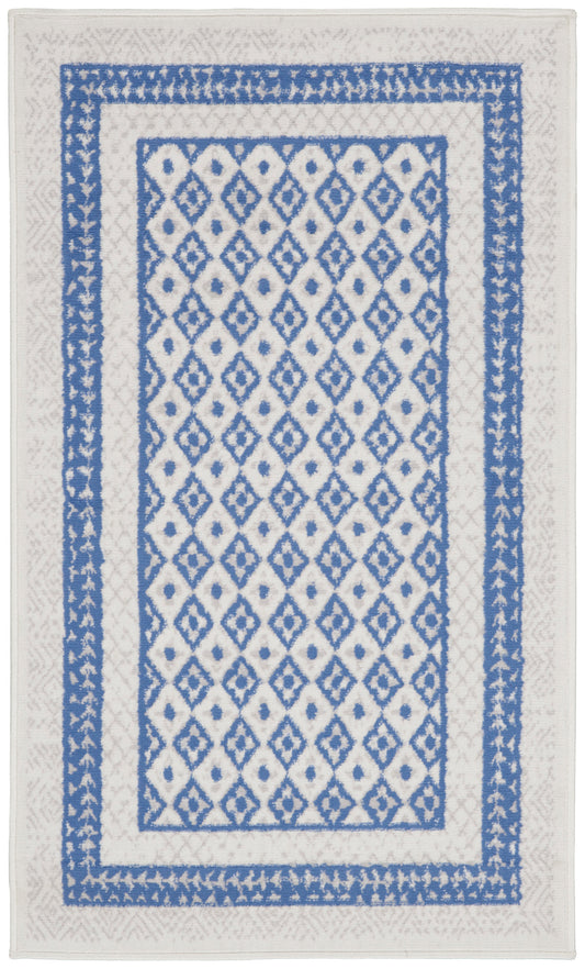 Rectangular white rug with a blue diamond lattice pattern, featuring blue inner and outer borders.