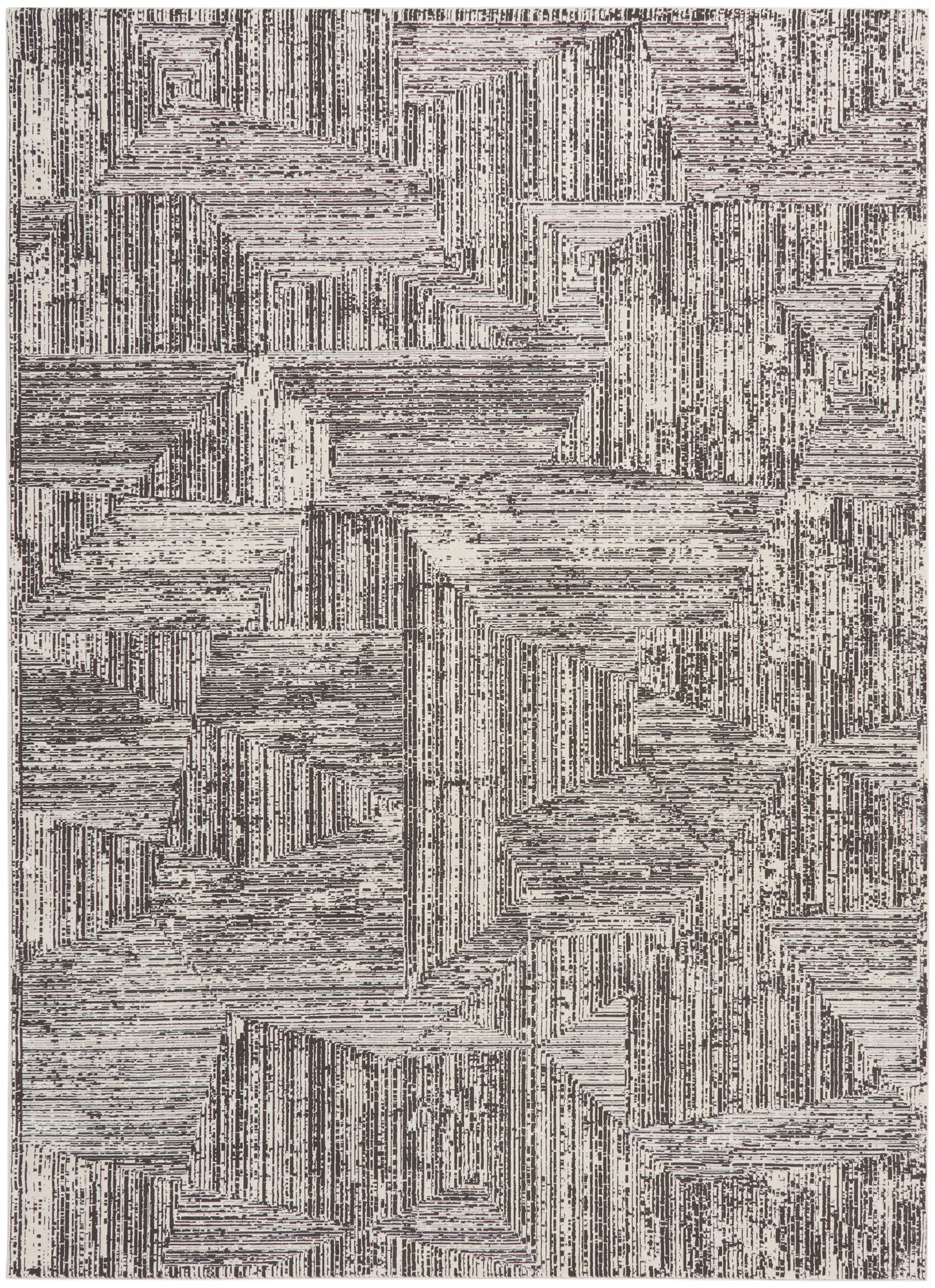 Abstract geometric area rug with cream and charcoal linear block patterns and textured stripes.