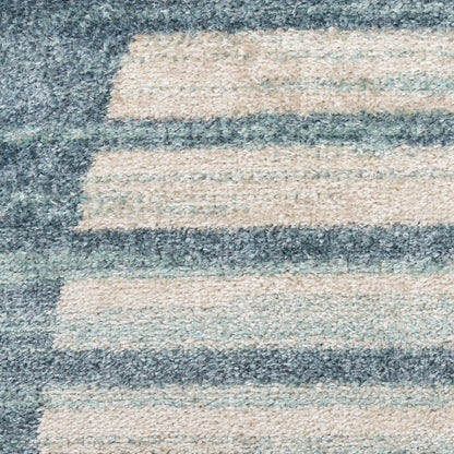 Beige and blue-gray striped shag area rug with soft, plush pile.