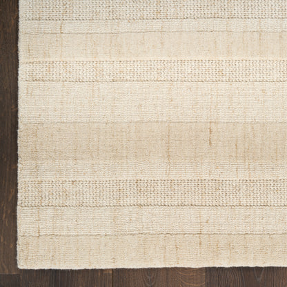 Cream and natural beige flat-weave rug with subtle horizontal stripes, natural fiber look for cozy living spaces.