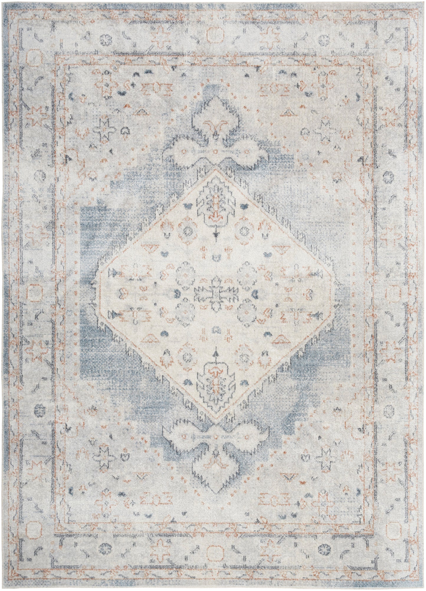 Distressed vintage-style oriental rug in soft blue and ivory with a diamond medallion and faded floral border.