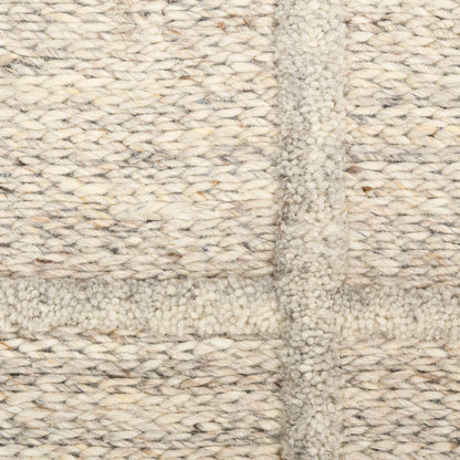 Cream beige chunky boucle rug with textured woven panels and soft cozy feel, 9' x 12'.