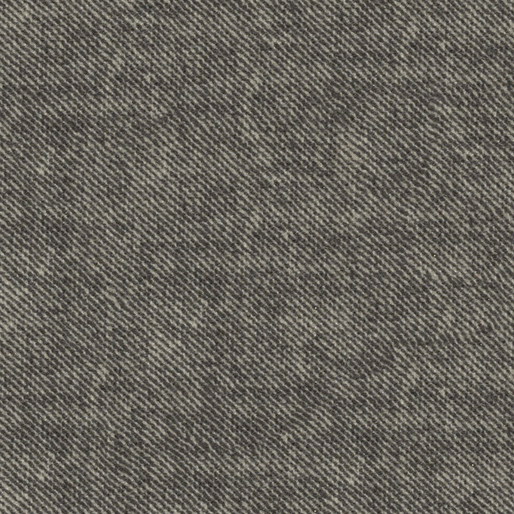 Close-up of grey denim fabric with diagonal twill weave and subtle mottled texture.