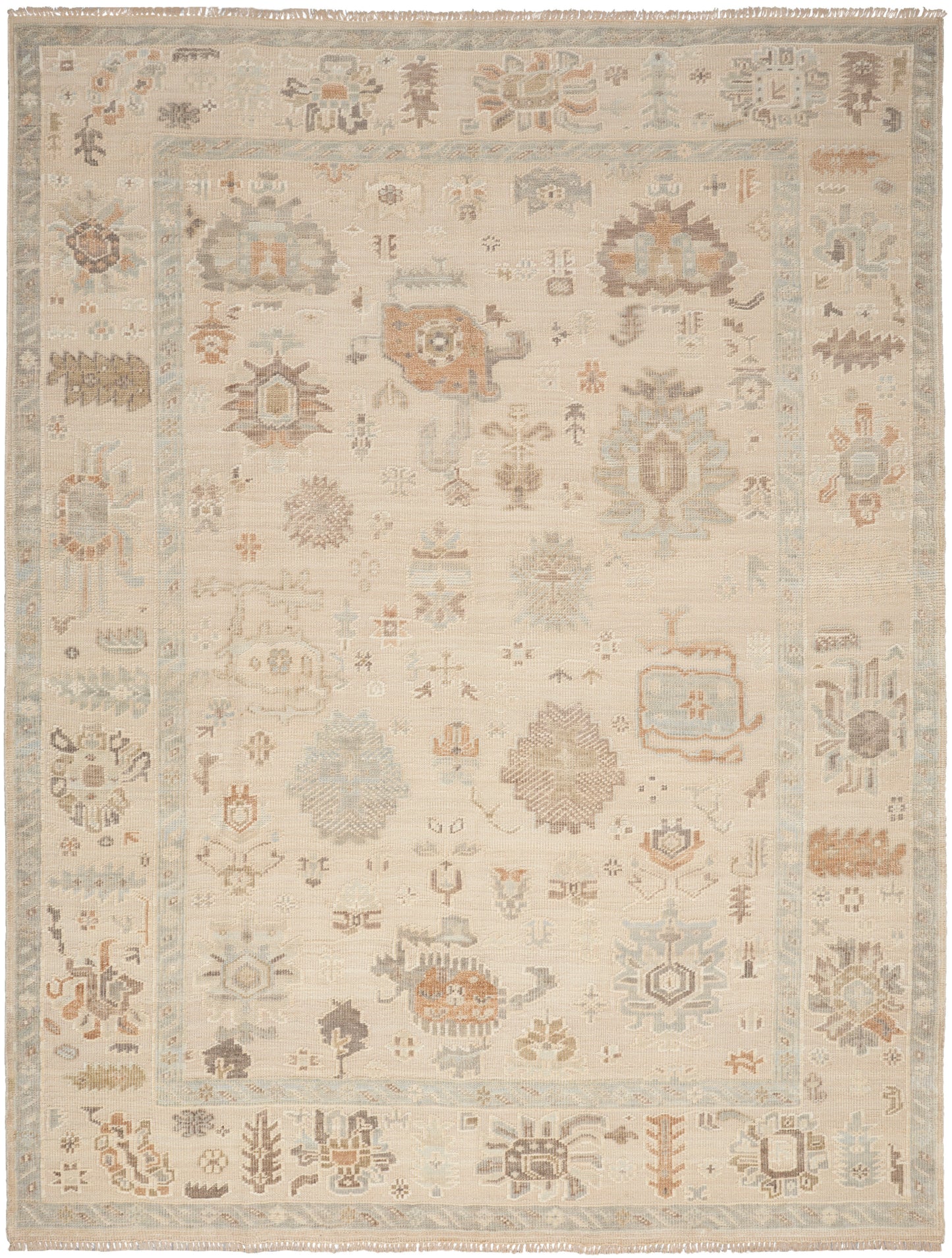 Cream-toned oriental rug with pale blue border, faded pastel medallion motifs, fringed ends.