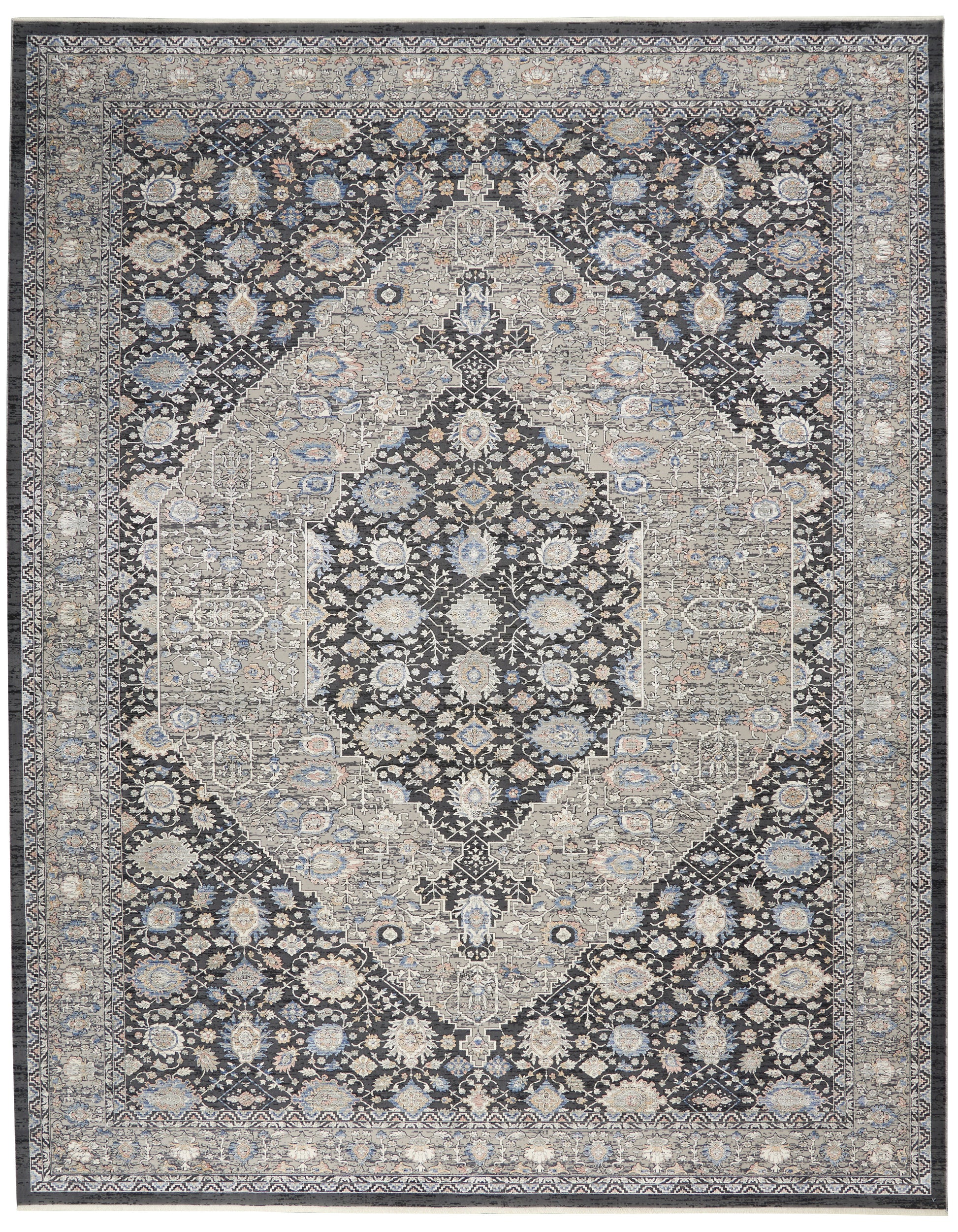 Persian-inspired oriental rug with a navy field, ivory and light blue floral medallion center, framed by intricate borders.