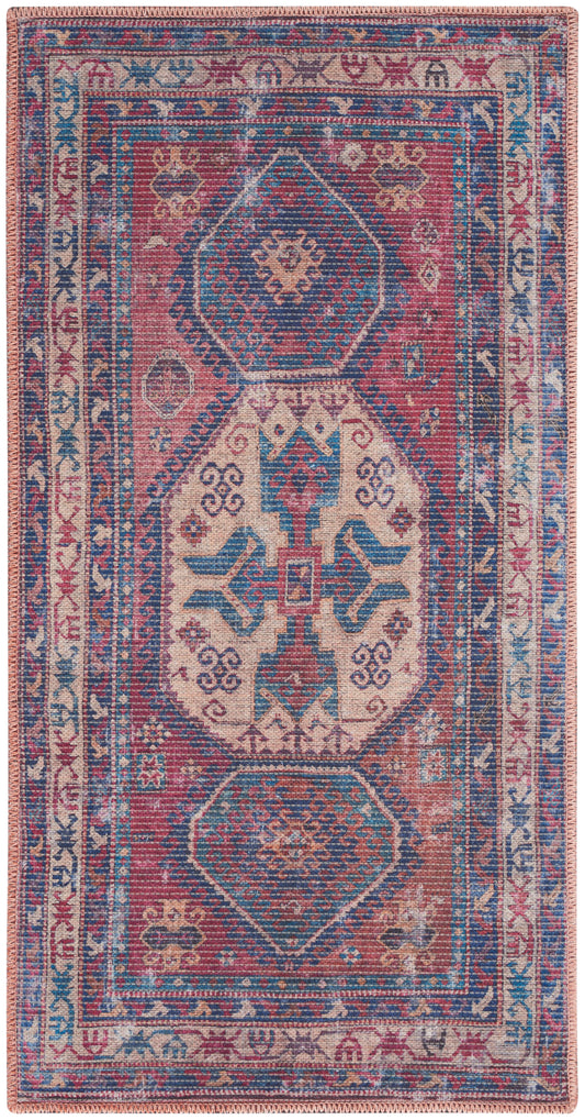 Rectangular Persian-style rug in pink, blue and cream with geometric medallions and floral borders.