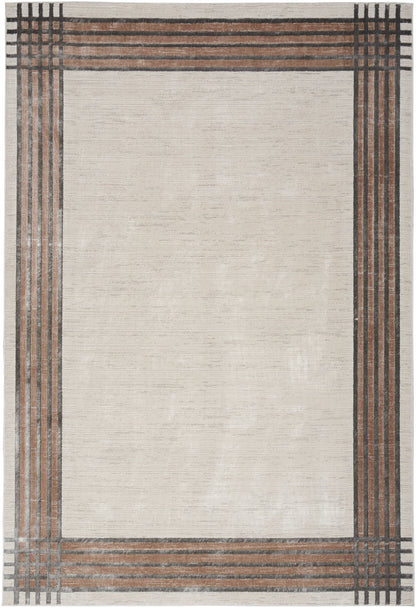 Beige modern area rug with brown and charcoal linear border framing the central field.