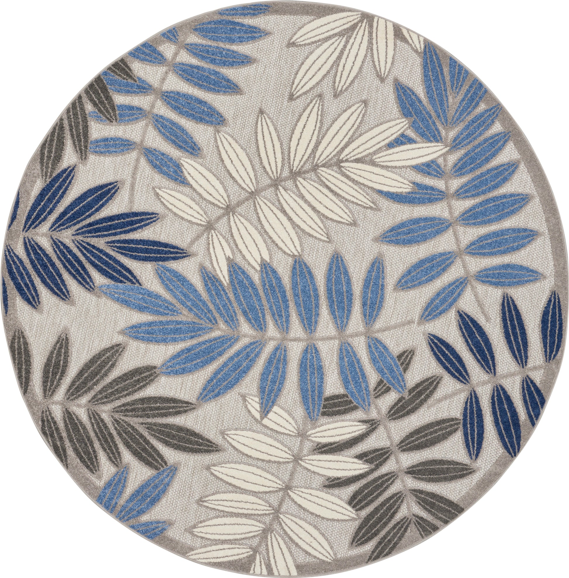 Round beige woven rug with blue, gray and white leafy botanical pattern.