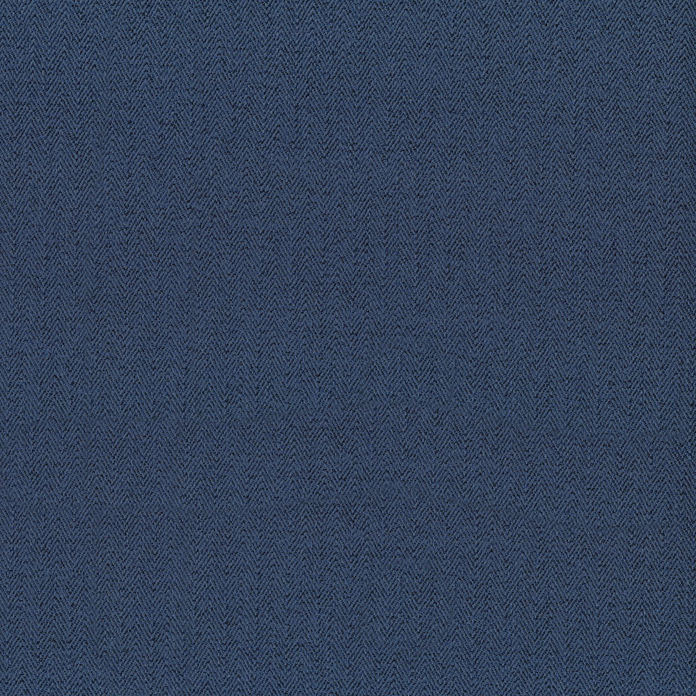 Indigo herringbone fabric close-up with subtle texture.