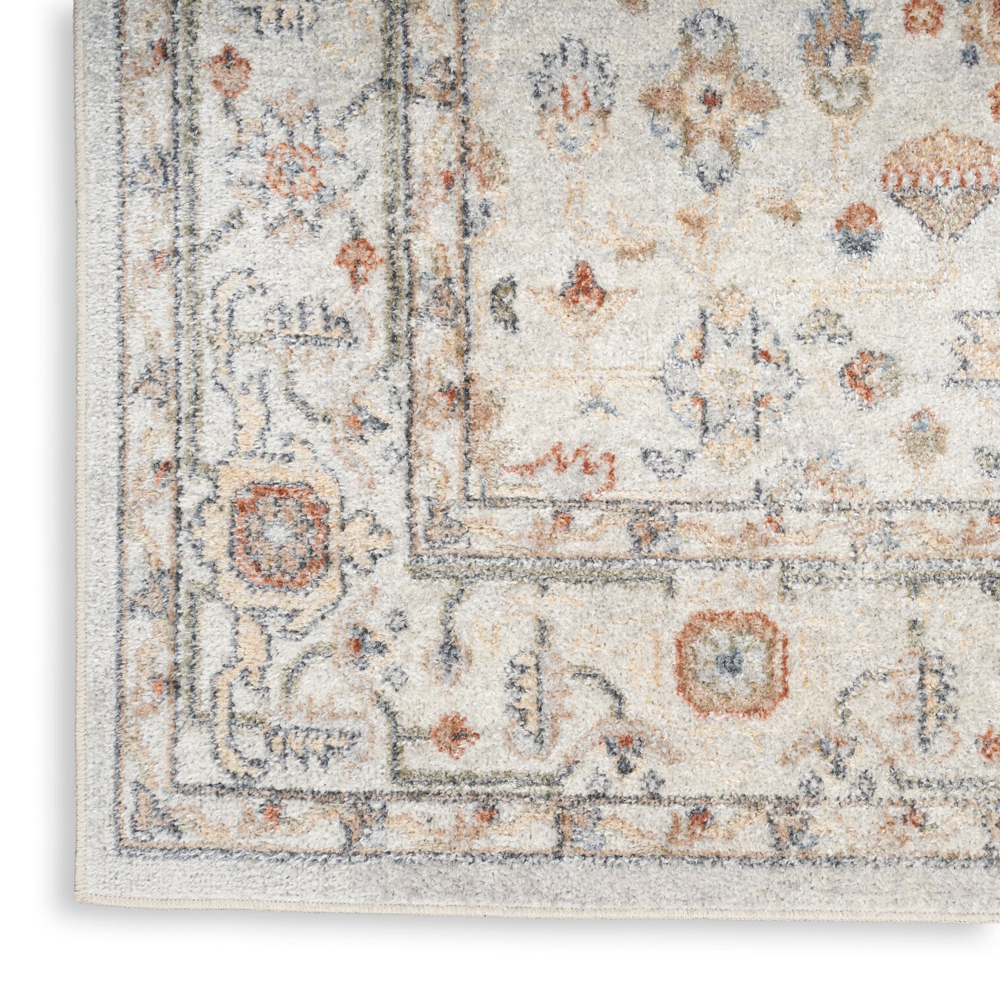 Cream Persian-style runner with blue and orange motifs, fringed edge, distressed soft pile and ornate border.