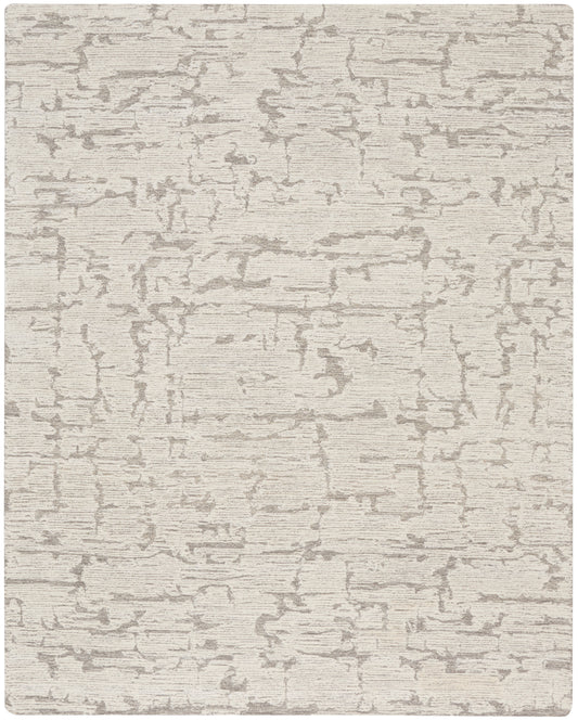 Beige rectangular area rug with gray crackle abstract pattern; plush, contemporary floor covering for living spaces.