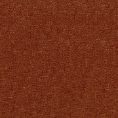 Close-up of rust-colored, solid fabric with a textured surface.