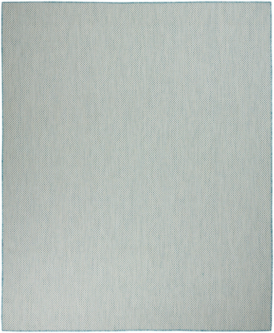 Rectangular rug with a pale blue polka-dot pattern and teal border; size 9' x 12'.