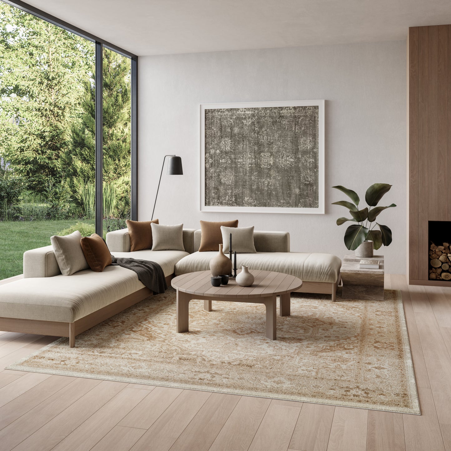 Neutral living room with beige sectional, round light-wood coffee table, cream rug, black floor lamp, abstract art, plant.
