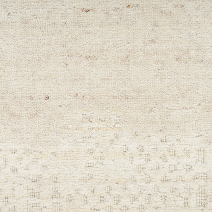Cream beige woven rug with soft texture and subtle speckled pattern.