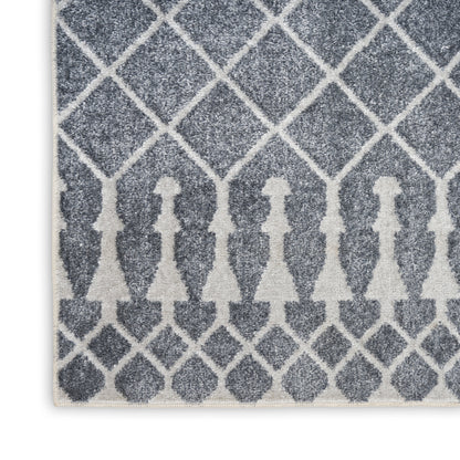 Grey textured rug with ivory lattice diamonds and a row of ivory silhouette figures along the edge.
