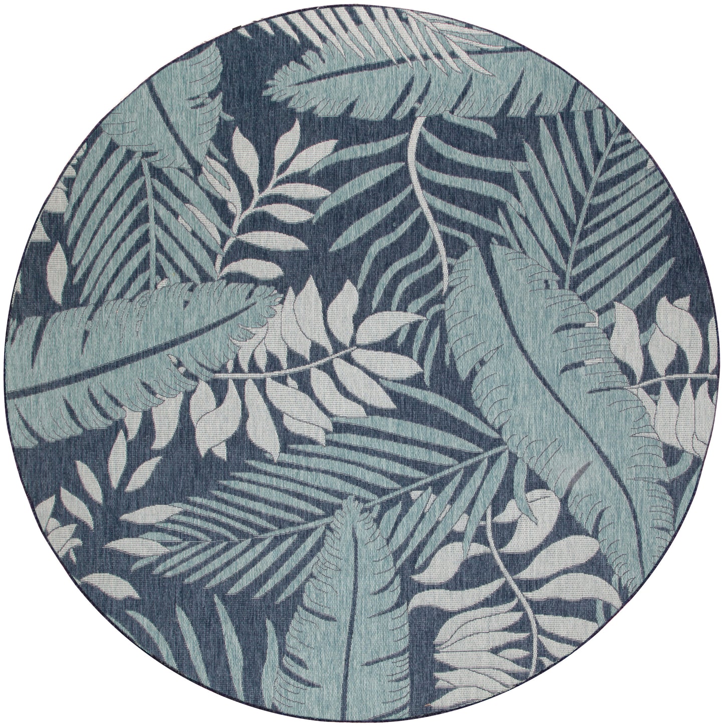 Round rug with navy background and light blue tropical palm leaf pattern.