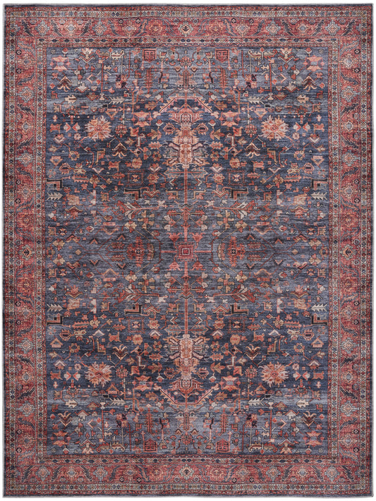 Rectangular Persian-style rug with navy field, red border, and ivory-pink floral motifs; traditional oriental design.