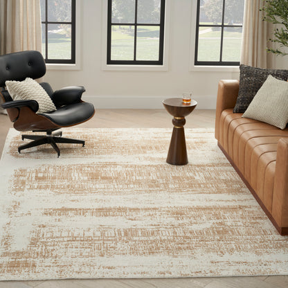 Living room with beige abstract-pattern rug, tan leather sofa, black leather lounge chair, and round wooden side table by a window.