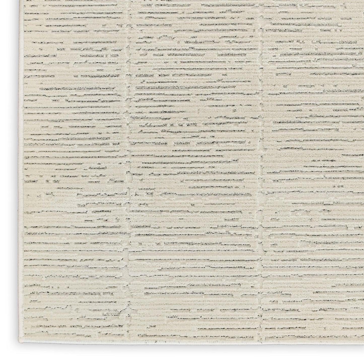 Beige rectangular woven rug with subtle raised horizontal stripes; neutral, modern textured floor decor.