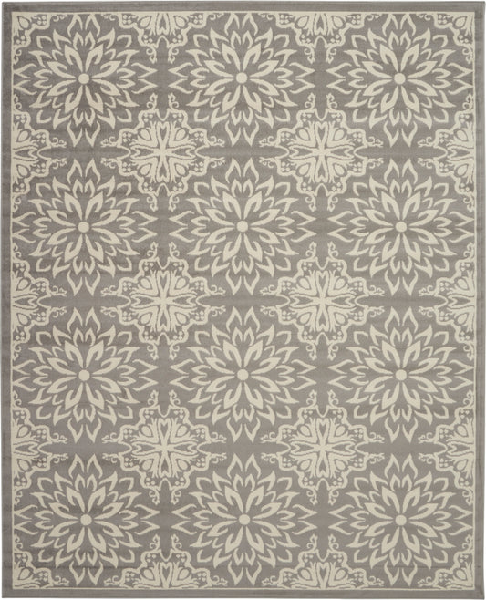 Gray rug with cream mandala floral medallions in a repeating pattern and decorative border.