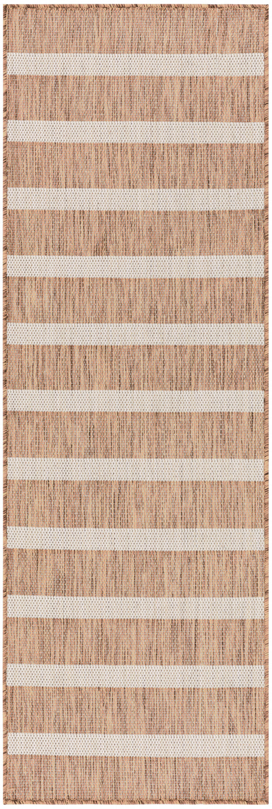Natural tan woven rug with white horizontal stripes and fringed edges; rustic coastal style.
