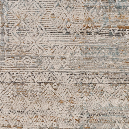 Distressed vintage-style runner rug with ivory, beige and pale blue geometric diamond motifs and soft textured pile.