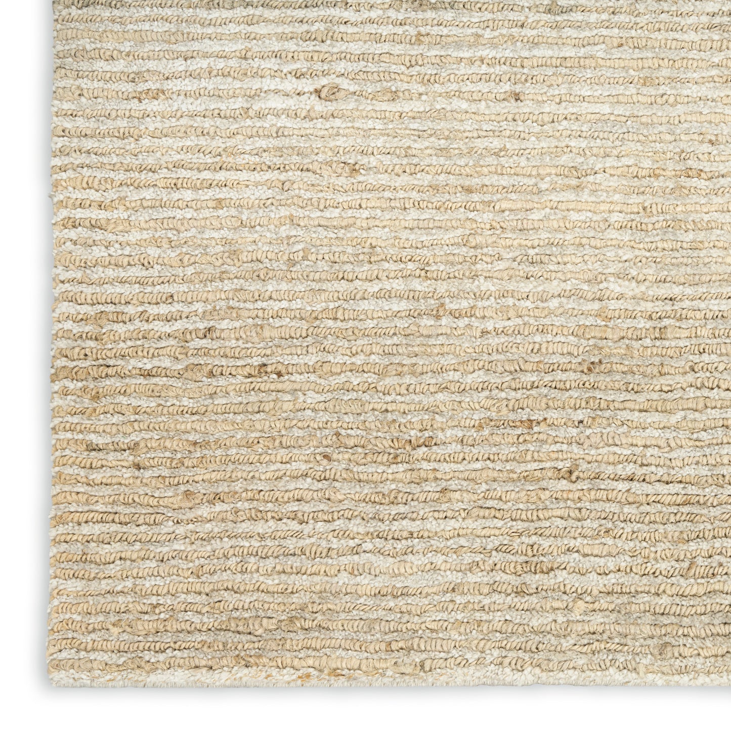 Natural beige woven rug with thick twisted jute loops, textured striped pattern, light earthy tones.