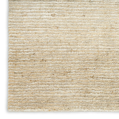 Natural beige woven rug with thick twisted jute loops, textured striped pattern, light earthy tones.