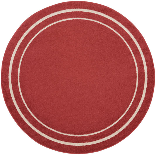 Round red rug with two cream rings along the edge; plush finish, modern minimalist style.