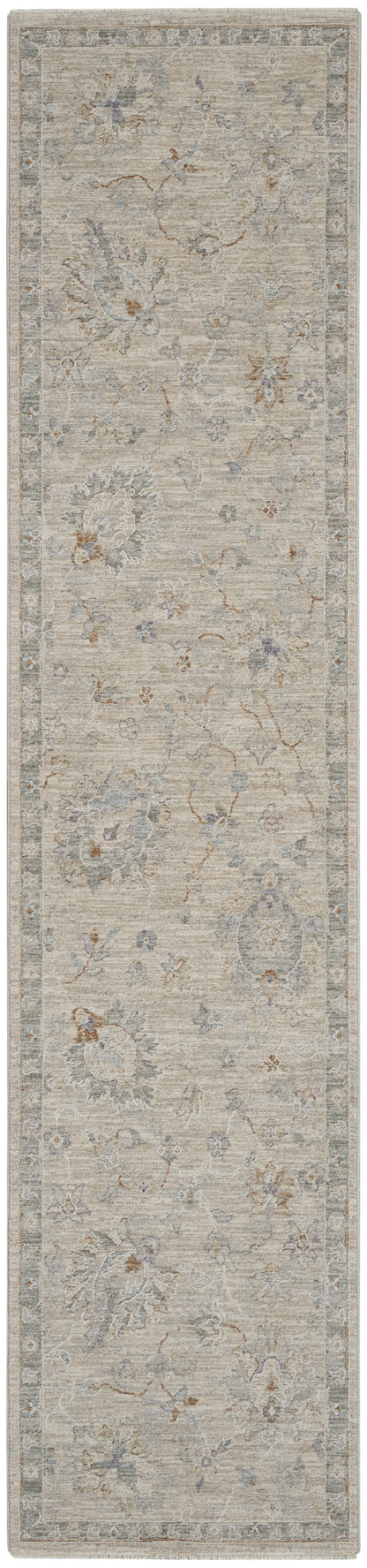 Beige floral runner rug with muted blue accents and decorative border; vintage, long narrow shape.