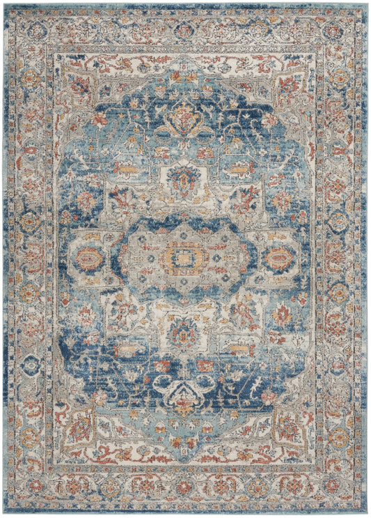 Rectangular Persian-style area rug with blue, ivory, and rust tones, central medallion and ornate floral border.