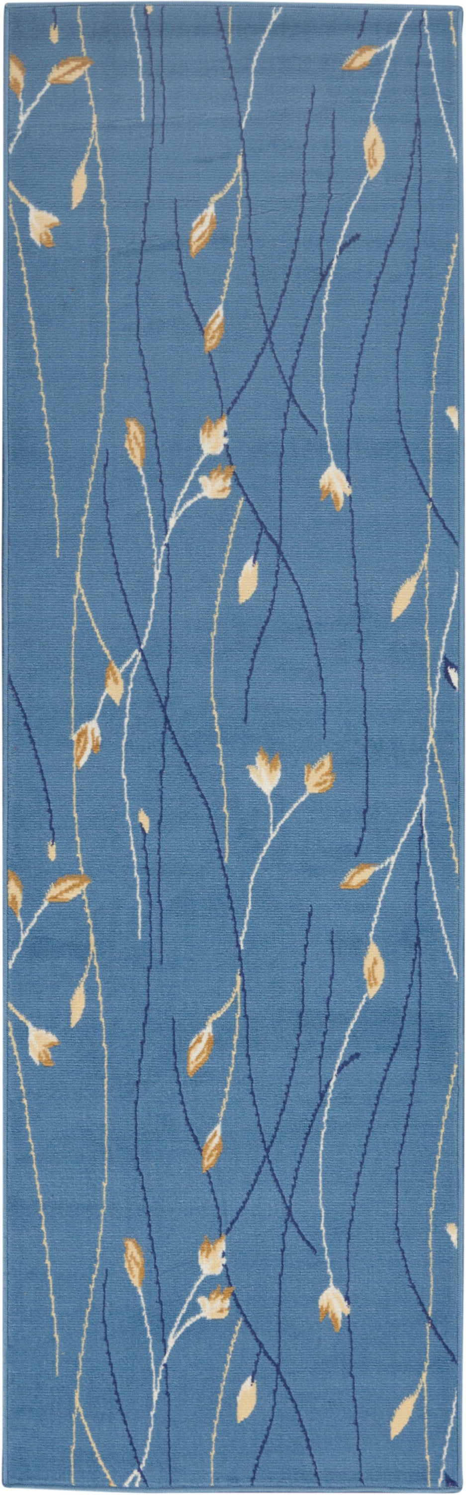 Blue runner rug with white and navy branching stems and golden yellow leaves in a botanical pattern.