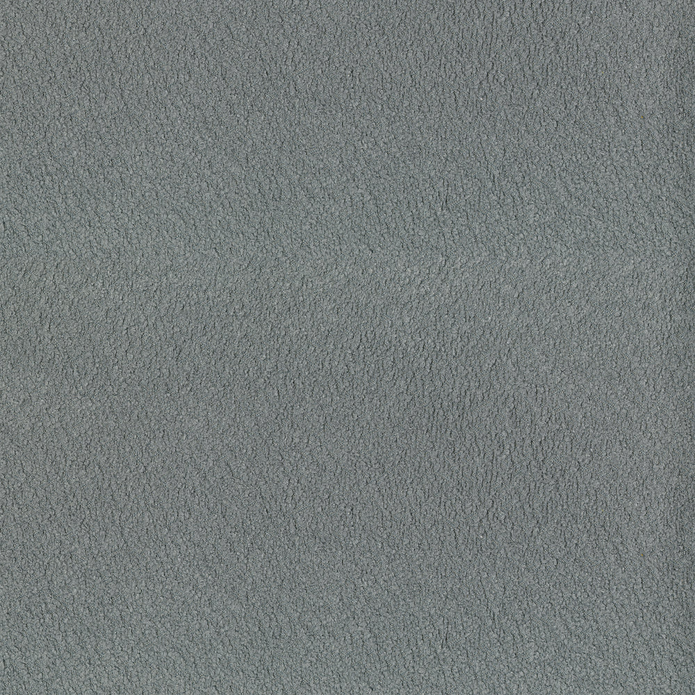 Close-up of grey suede-like microfiber fabric texture & soft matte upholstery material.