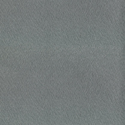 Close-up of grey suede-like microfiber fabric texture & soft matte upholstery material.