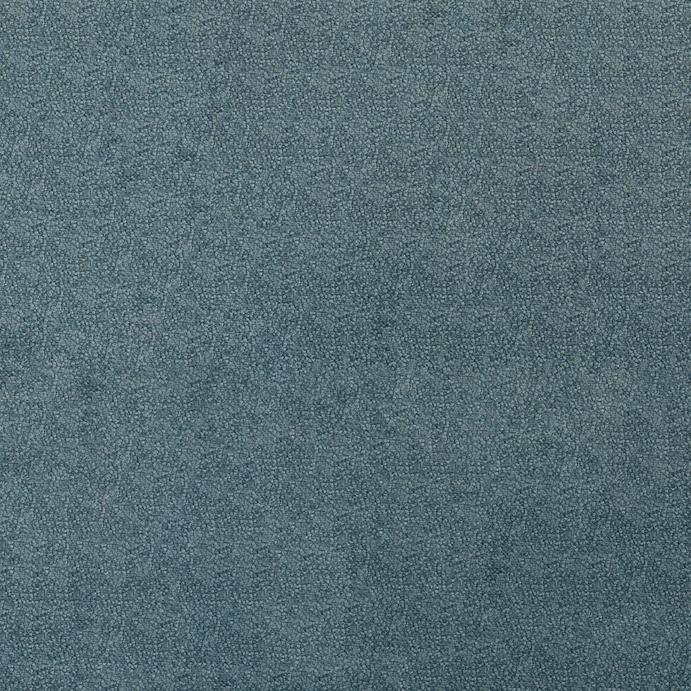 Close-up of true blue textured fabric with a subtle heather pattern; soft upholstery textile.