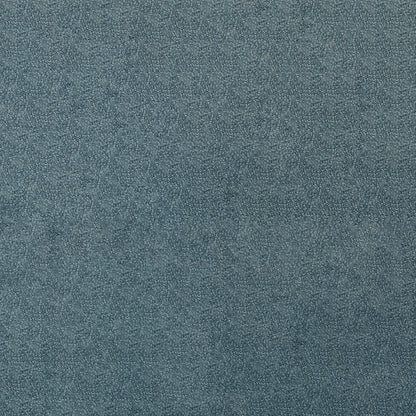 Close-up of true blue textured fabric with a subtle heather pattern; soft upholstery textile.