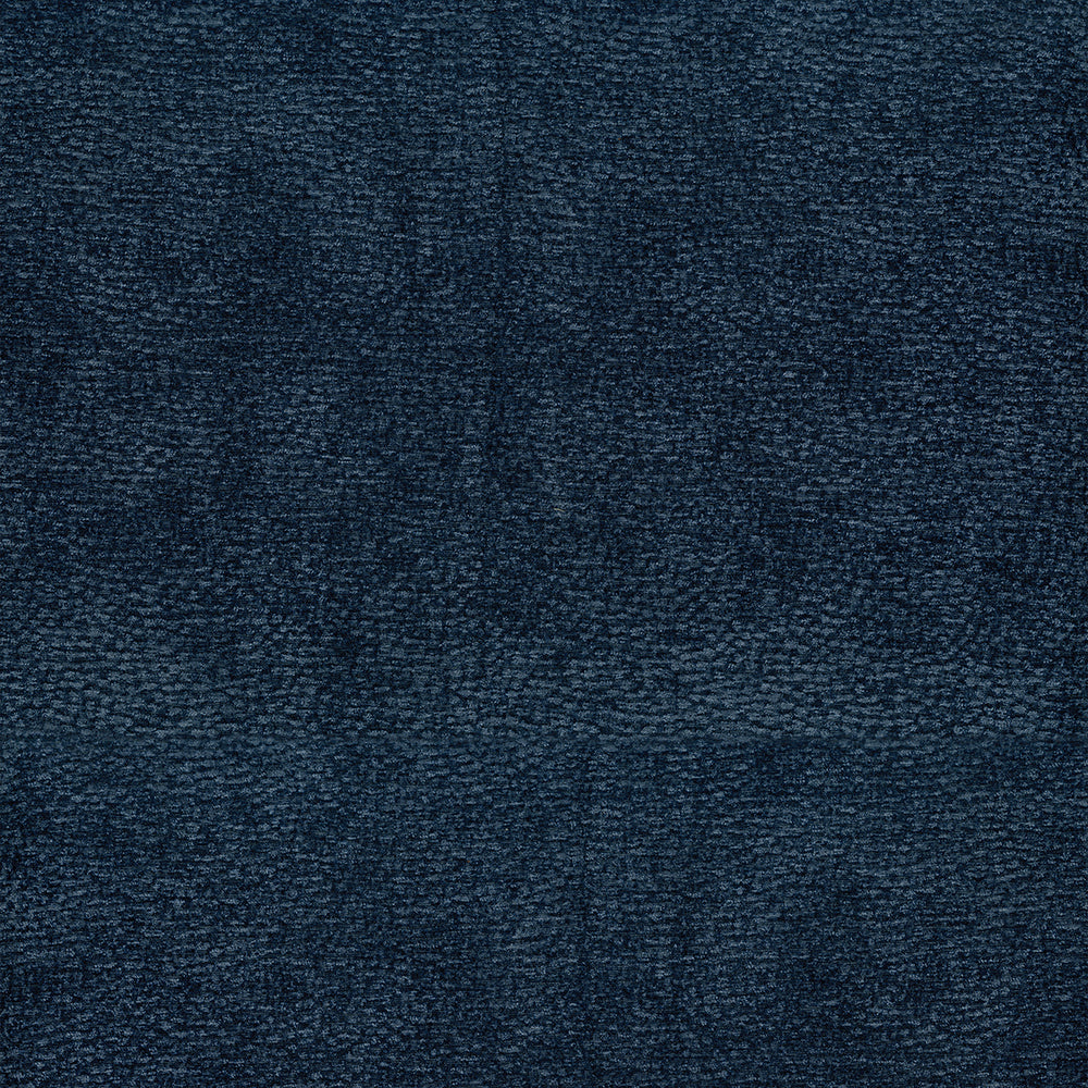Close-up of dark navy blue textured fabric with loop pile.
