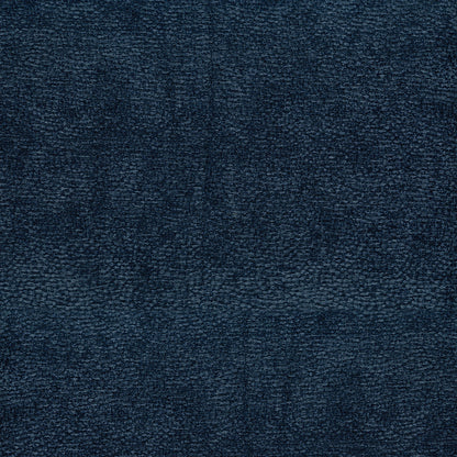 Close-up of dark navy blue textured fabric with loop pile.