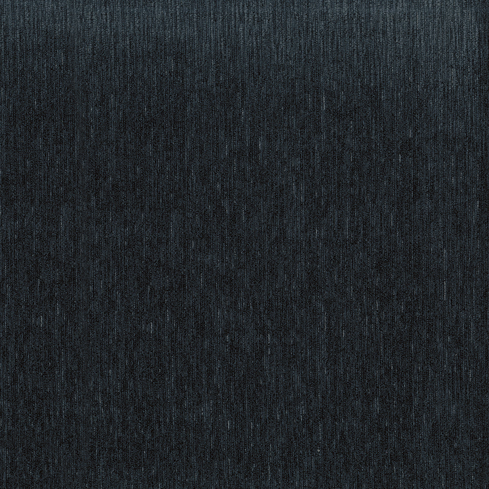 Dark charcoal gradient backdrop with subtle texture; minimalist moody setting for premium product shots.