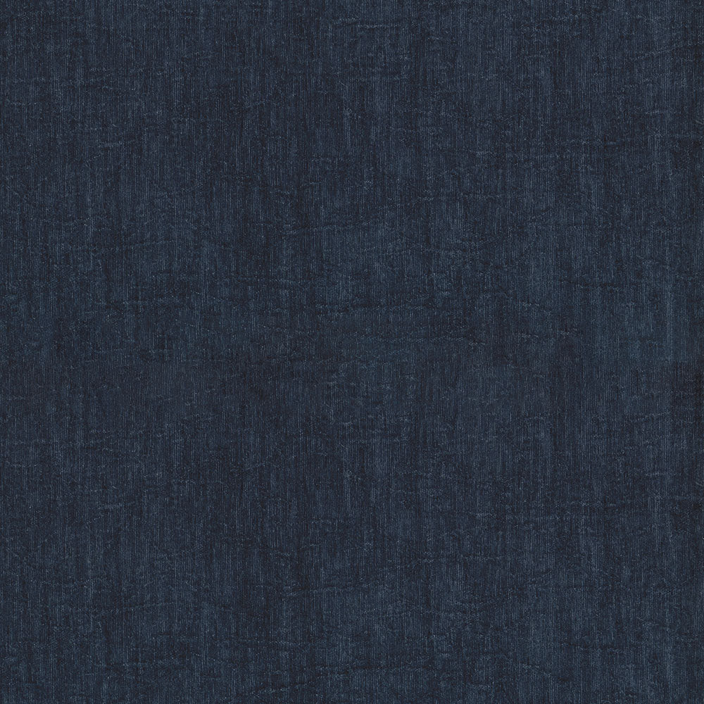 Dark navy outfit on model with straight-cut silhouette; minimalist casual wear in soft fabric.