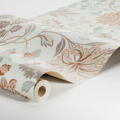 Roll of pastel floral wallpaper with cream background; peach, teal and gray blossoms.