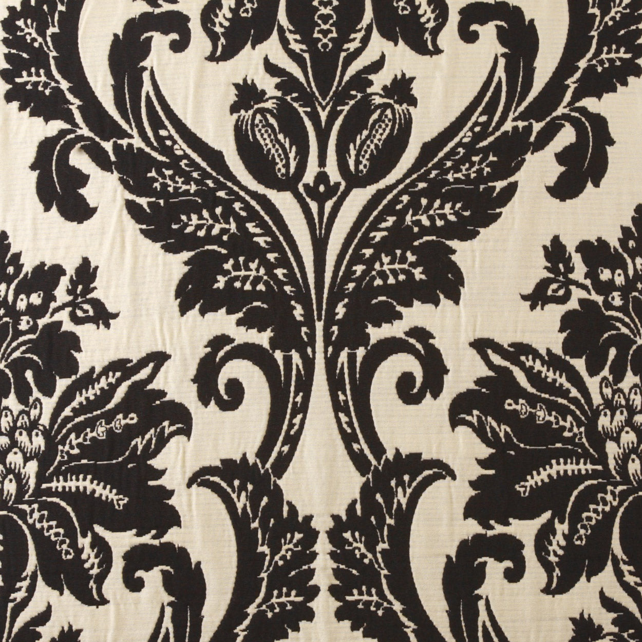 Beige fabric with large black damask floral pattern and scrolling motifs.