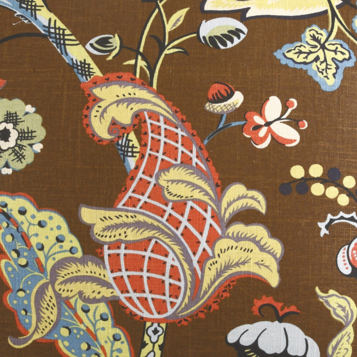 Brown fabric featuring a vibrant paisley-floral pattern with red lattice teardrops, yellow leaves, and blue accents.