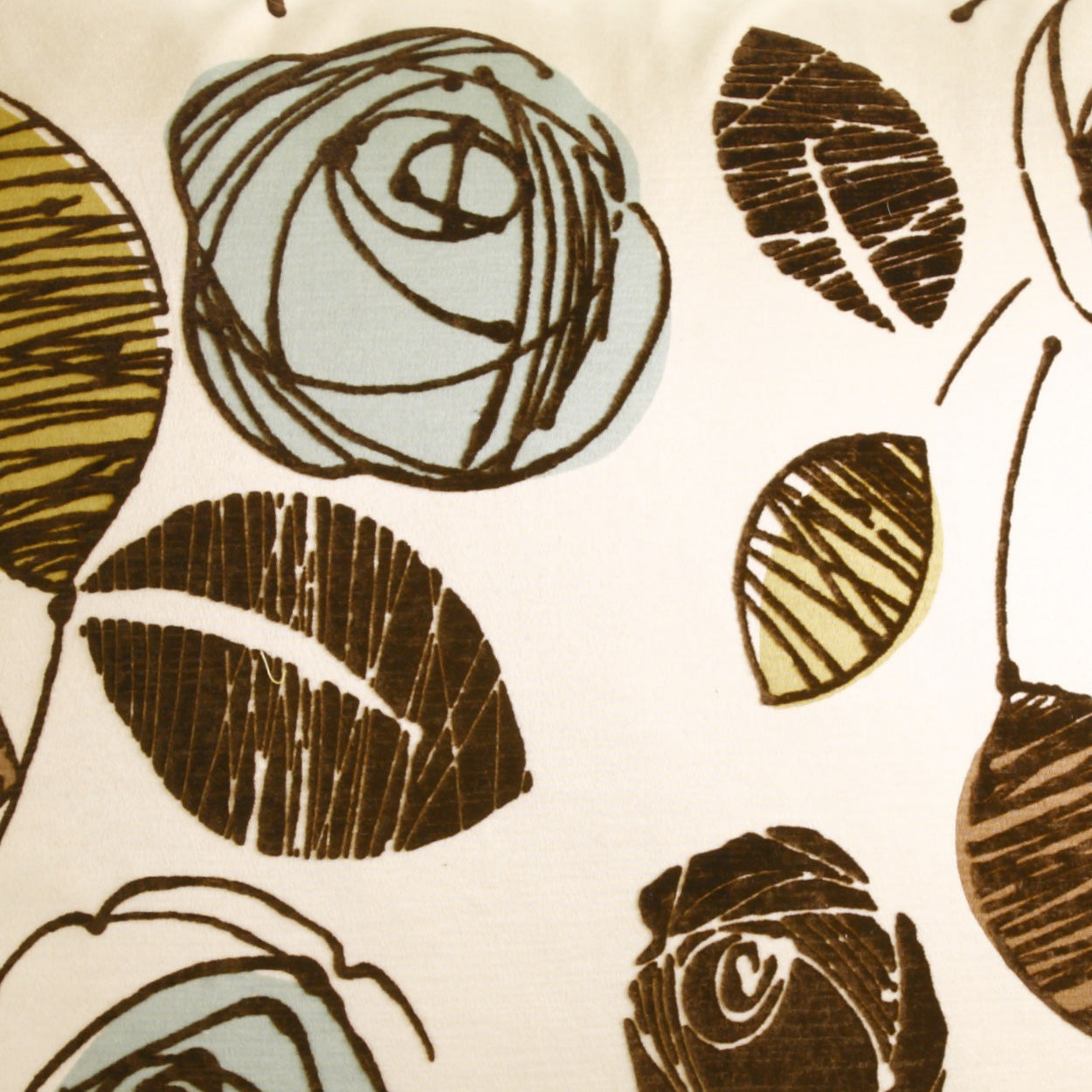 Cream fabric featuring brown leaves and pale blue circular rosettes in a retro botanical print.