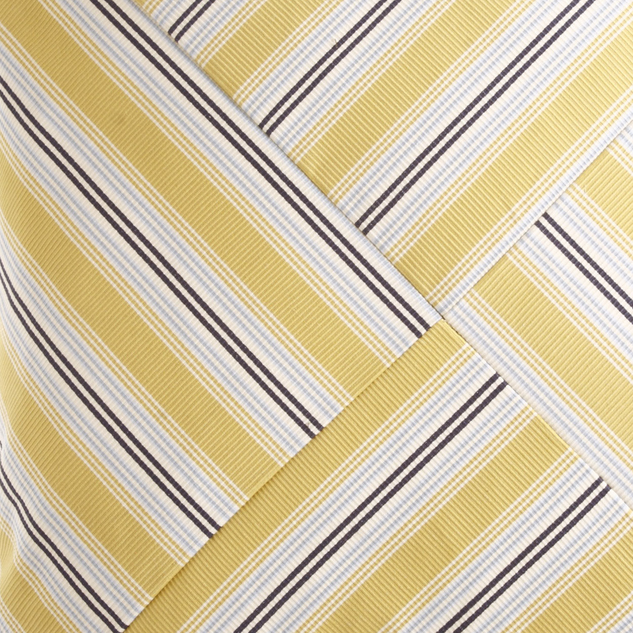 Gold-yellow striped plaid fabric with white, light blue and dark navy lines in a textured twill weave.