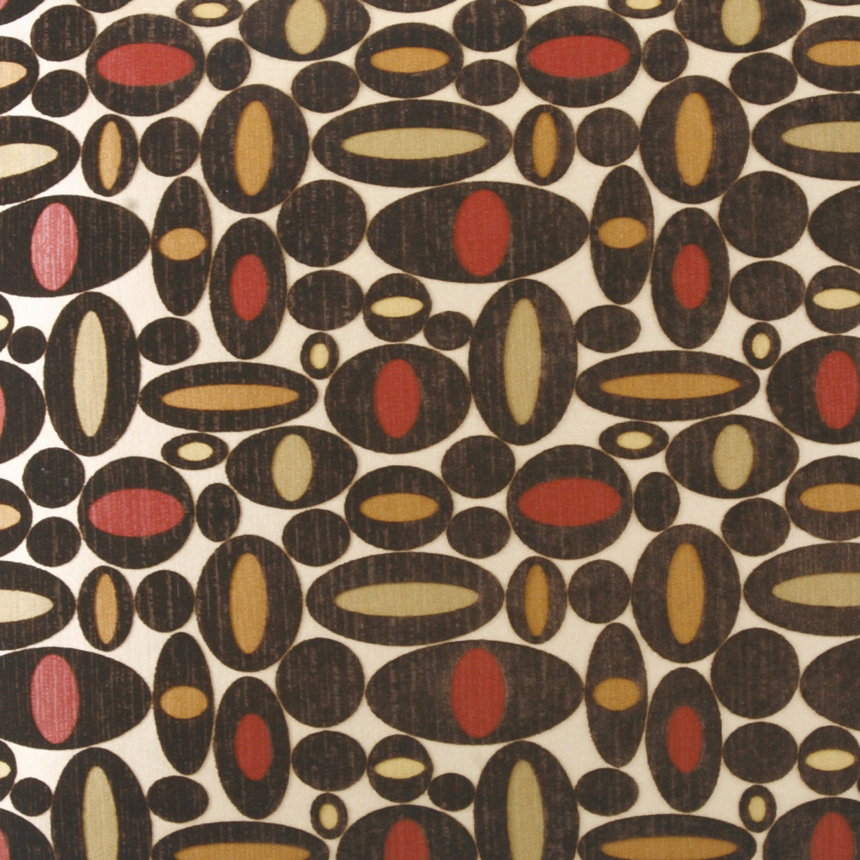 Retro fabric pattern of black oval shapes with inner red, pink, tan, or olive ellipses on a cream background.
